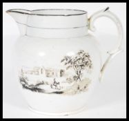 An 18th Century pearlware creamer jug having transfer printed old house scenes