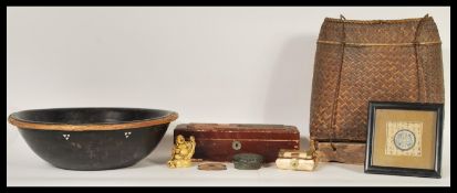A collection of items to include a Chinese wooden bowl with inset monetary token inset into the base