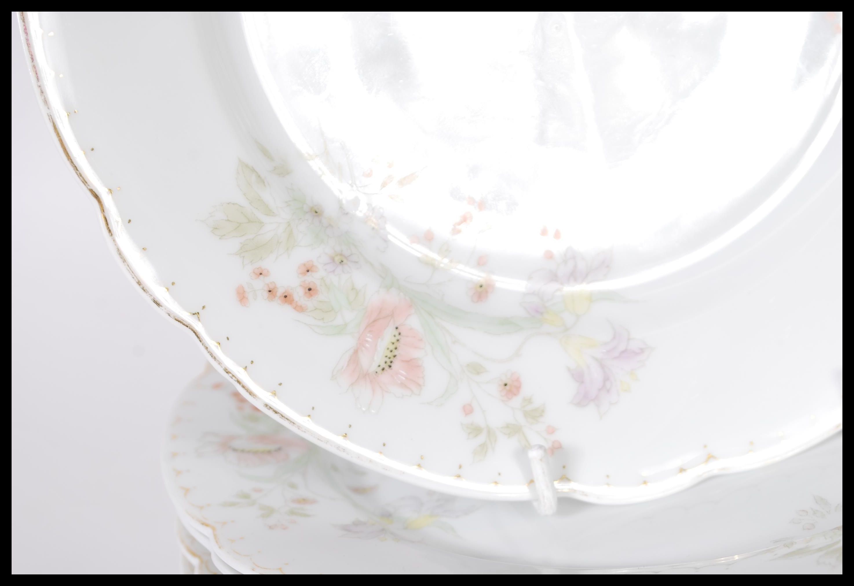 A 20th Century German porcelain dinner service having hand painted floral decoration consisting of - Image 2 of 5