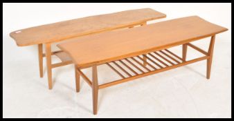 Two vintage retro 20th Century coffee tables consisting of a teak example with railed magazine