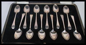 An early 20th Century cased set of 12 silver hallmarked teaspoons complete in fitted case.