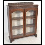 A late 19th century Victorian glazed bookcase / di