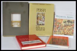 A group of books on antique topics to include An Encyclopedia of Medieval Iberia, Persia The