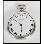 A mid 20th century silver white metal Longines pocket watch, having a white enameled face with roman