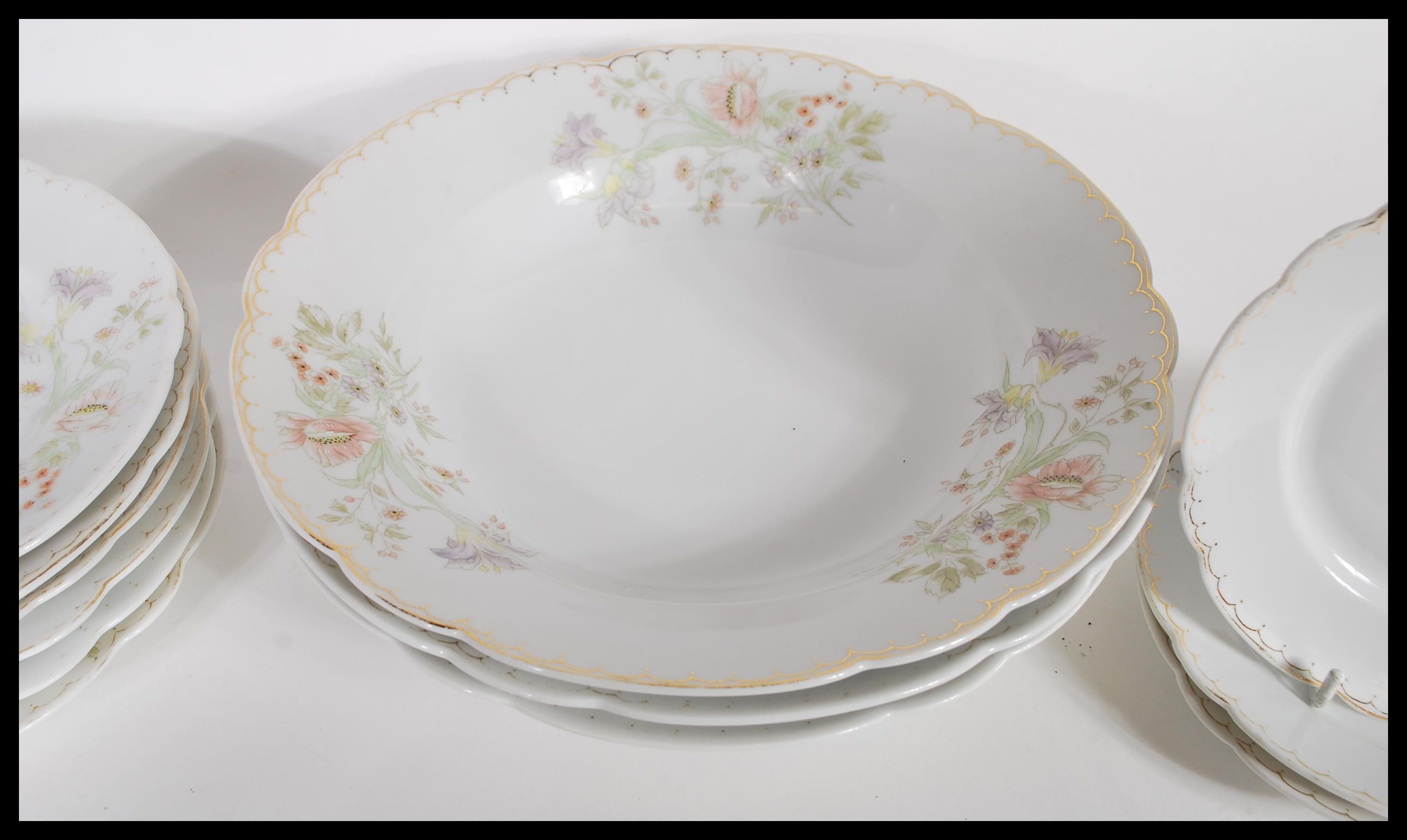 A 20th Century German porcelain dinner service having hand painted floral decoration consisting of - Image 3 of 5
