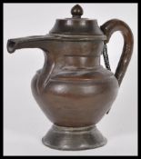An unusual believed 19th century bronze teapot / tea pot of Islamic origin. The teapot with
