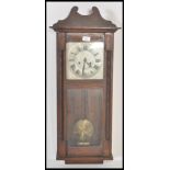 A 20th Century mahogany cased regulator wall clock, eight day movement with silver dial and Roman