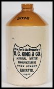 A large antique vintage stoneware flagon with notation to front for G. C. King & Co of Bristol.