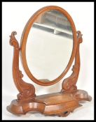 A 19th Century Victorian mahogany dressing table swing mirror of large form raised on oval base with