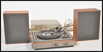 A vintage retro 20th Century teak cased Dansette record player Model No A4005, fitted with a BSR