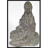 A good Chinese cast iron figure modelled as the Bodhisattva samantabhadra seated in lalitasana on