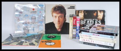 A collection of 20th and 21st century Beatles memorabilia, to include vinyl longplay records and