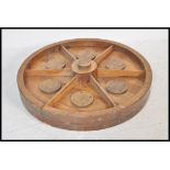 A decorative large oak bound cart wheel, the wheel ideal for coffee table conversion with solid