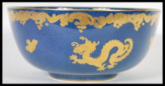 A vintage 20th Century Chinese influences dragon centerpiece bowl of good proportions having a