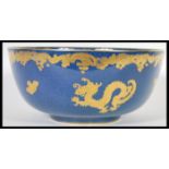 A vintage 20th Century Chinese influences dragon centerpiece bowl of good proportions having a