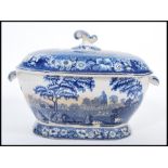 An early 19th century Georgian spode blue and white large tureen and lid having typical decoration