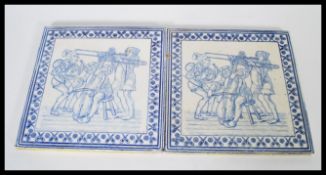 A pair of 19th Century Victorian blue and white transfer printed floor tiles by E Smith depicting