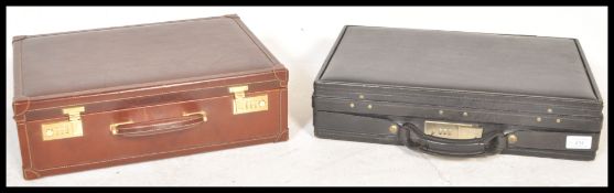 Two vintage leather suitcases to include a brown italian Casani business case with a