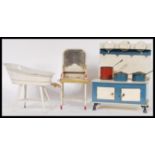 A group of vintage early 20th Century large scale dolls house / childrens tinplate furniture