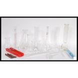 A collection of vintage 20th Century Scientific medical lab glass and instruments to include various