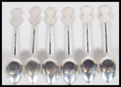 A  set of six cased silver hallmarked teaspoons, the teaspoons with Hong Kong hallmarks.