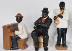 A collection of vintage Jazz band figurines, to include trumpet player, saxophone, singers,