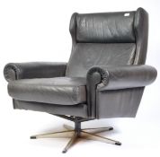 STUNNING MID 20TH CENTURY BUFFALO HIDE LEATHER SWIVEL CHAIR