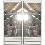 A PAIR OF LARGE 20TH CENTURY INDUSTRIAL SHOP MIRRORS