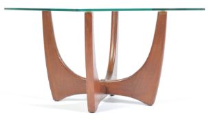 A MID CENTURY G-PLAN TEAK WOOD AND GLASS COFFEE TABLE