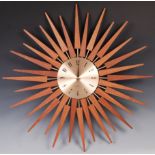 AFTER GEORGE NELSON A CONTEMPORARY STARBURST WALL CLOCK