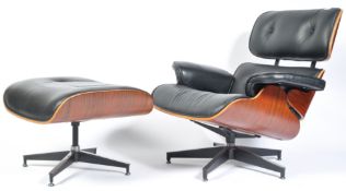 AFTER CHARLES AND RAY EAMES A CONTEMPORARY LOUNGE CHAIR AND OTTOMAN