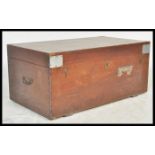 An early 20th Century blanket box, the painted brass bound body with hinged lid to top and latch