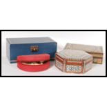 A collection of four 20th Century jewellery boxes to include an inlaid example, ostrich skin example