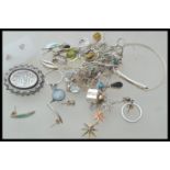 A selection of silver jewellery to include necklace chains, a bangle bracelet, a silver pendant