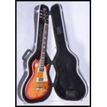 A Vantage made Gibson style electric six string guitar. Flame / Cherry sunburst body, with cream