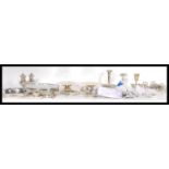 A collection of silver plated wares to include various a1 silver plate flatware, pepperettes, blue