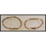 Two hallmarked 9ct gold flat link bracelet chains one having hidden clasp with foldover catch and