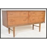 A vintage Danish influence retro 20th Century teak wood sideboard of small proportions having four