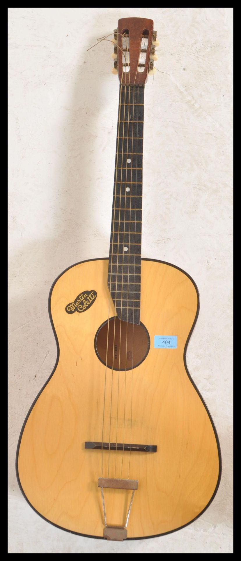 A vintage retro 20th Century Spanish acoustic six string guitar by Martin Callerti having a shaped