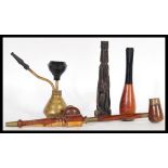 A good collection of antique and early 20th Century smoking tobacco and other pipes to include