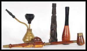 A good collection of antique and early 20th Century smoking tobacco and other pipes to include