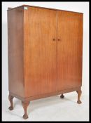 A 20th Century oak tall boy cabinet chest converted in to a record cabinet / filing cabinet, twin