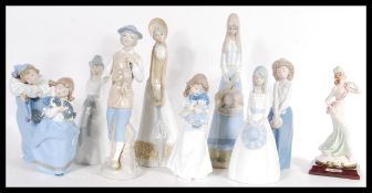 A group of nine 20th Century Spanish Lladro Nao and other ceramic figurines along with a Capodimonte