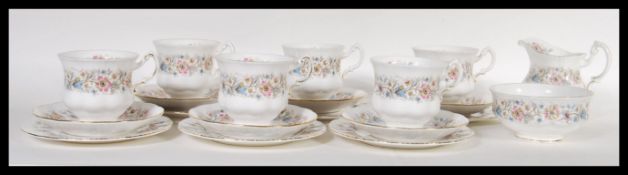 A 20th Century Paragon fine English bone china tea service in the Meadow Vale pattern consisting
