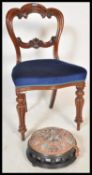 A 19th Century mahogany balloon back chair, having blue velvet upholstery along with a Victorian