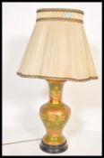 A 20th Century Chinese Satsuma style table lamp of bulbous form, the bulbous body on green ground