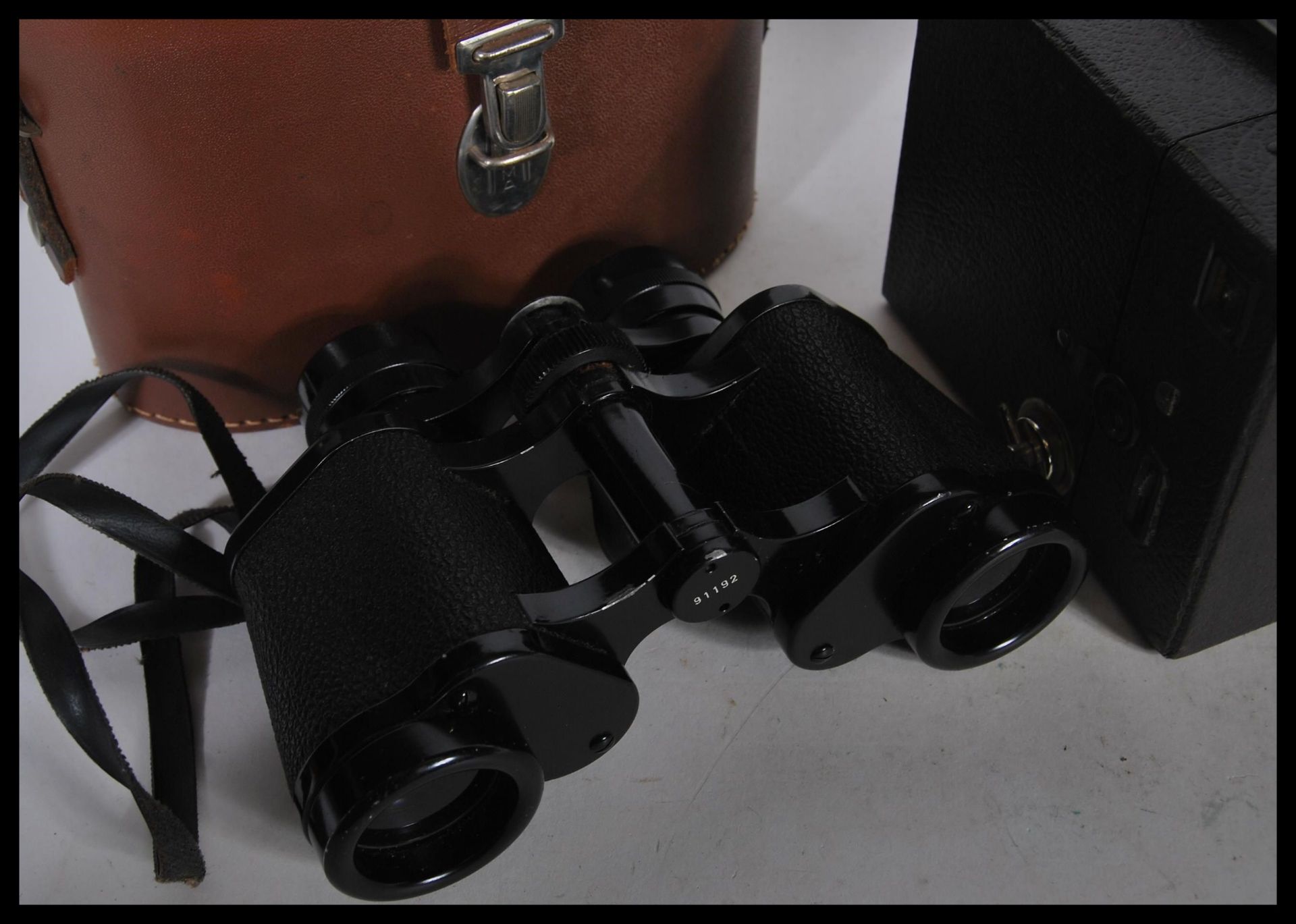 A pair of Hartzmann Wetzler 117 binoculars set within a brown leather case along with two box film - Bild 2 aus 4