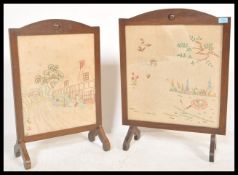 A pair of early 20th Century / 1940's  mahogany fire guards - screens having hand embroidered art