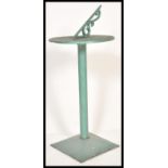 A vintage 20th Century antique style garden sundial table raised on square base with tubular
