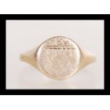 A 9ct gold gentleman's signet ring with plain cartouche front, size L and 1.9g